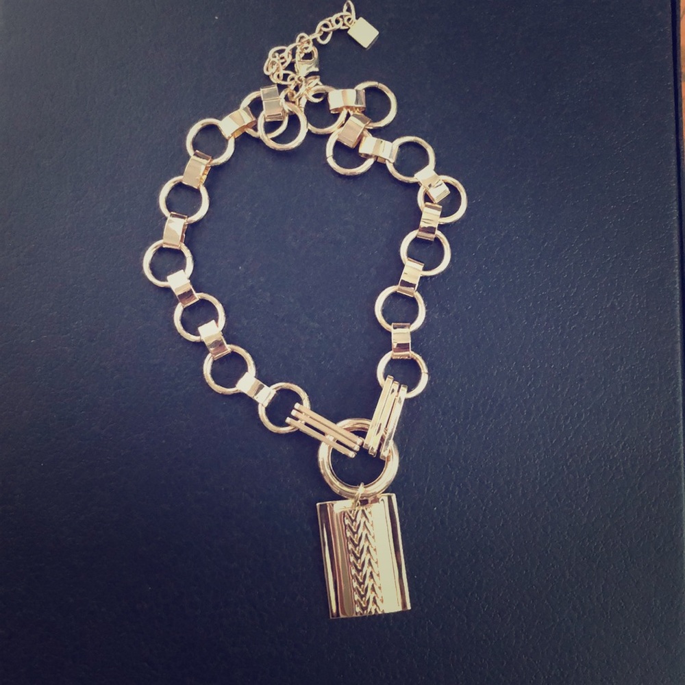 Gold necklace with square pendant